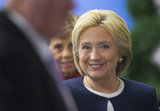 Democratic presidential candidate Hillary Clinton smiles as she walks off-stage after speaking at the Atlantic Council Womens Leadership in Latin America Initiative in Washington Monday Nov. 30 2015