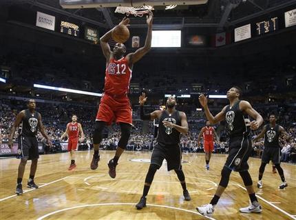 Los Angeles Clippers Luc Richard Mbah a Moute dunks during the first half of an NBA basketball game against the Milwaukee Bucks Wednesday Dec. 9 2015 in Milwaukee