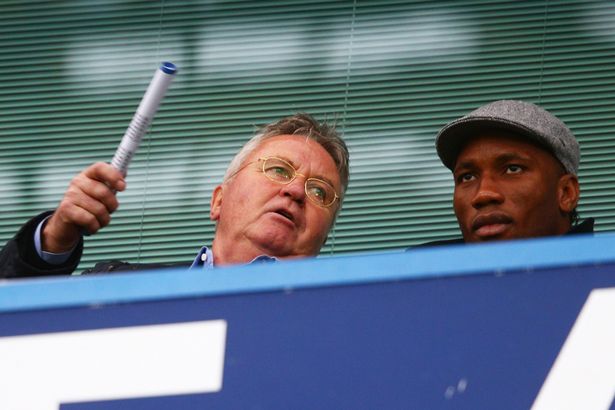 Chelsea interim manager Guus Hiddink and Didier Drogba