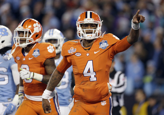 Clemson's Deshaun Watson celebrates his touchdown against North Carolina during the first half of the Atlantic Coast Conference championship NCAA college football game in Charlotte N.C. Saturday Dec. 5 2015