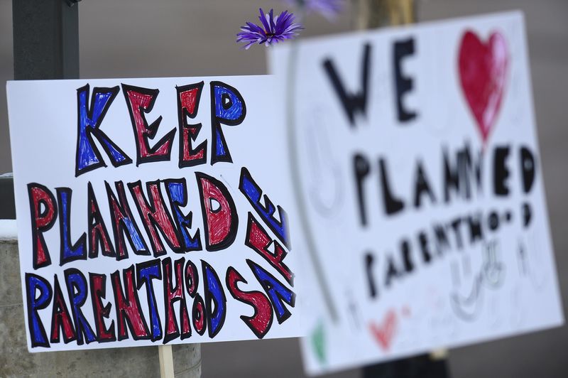 Signs in support of Planned Parenthood at Fillmore Street and Centennial Boulevard