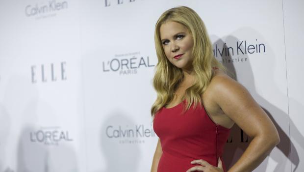 Comedian Amy Schumer poses at the 22nd annual ELLE Women in Hollywood Awards in Los Angeles Oct. 19 2015.         
                                     Mario Anz