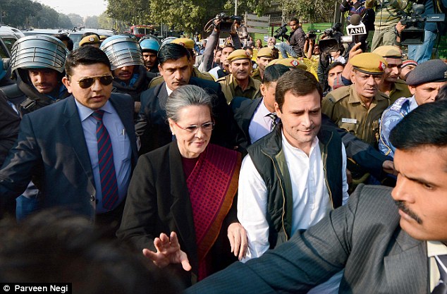 Congress president Sonia Gandhi and party vice president Rahul Gandhi arrive at the party office after the court hearing in the National Herald case