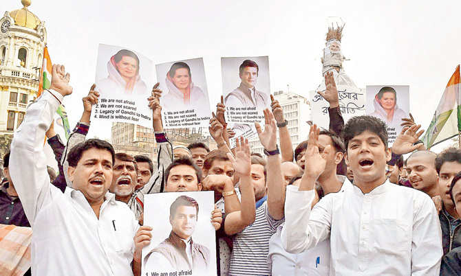 Congress workers shout anti Modi slogans in Kolkata. Pic  pti