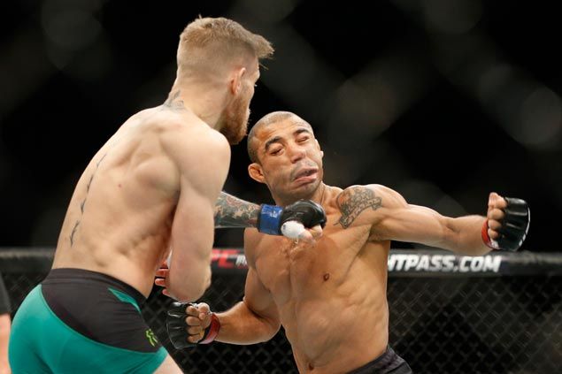 Conor Mc Gregor backs up bravado stops Jose Aldo in 13 seconds with one cracking punch