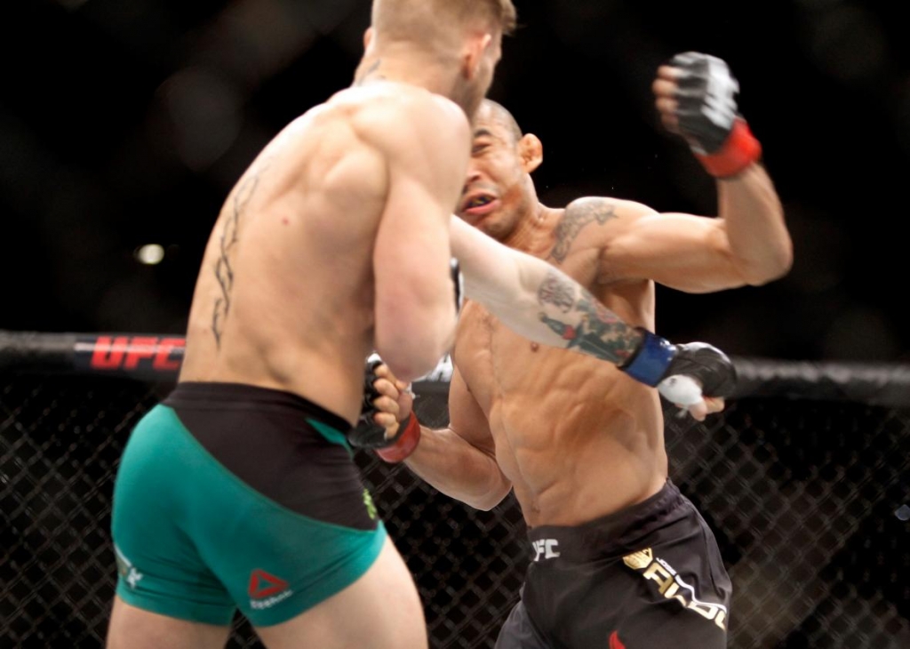 501168940-conor-mcgregor-knocks-out-jose-aldo-in-the-first-round