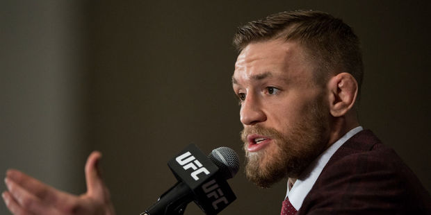 Conor Mc Gregor speaks to the media after his win