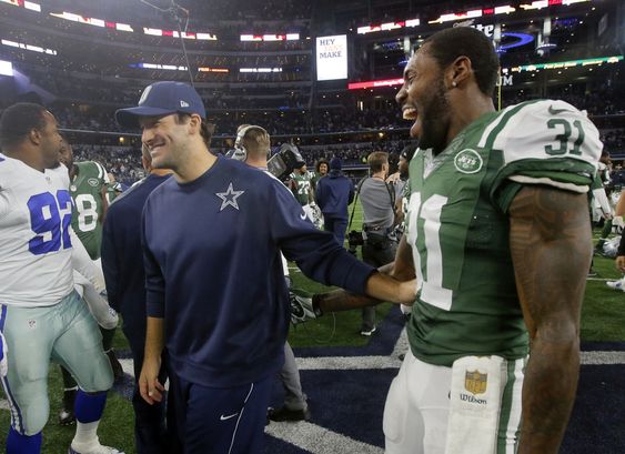 Romo left and New York Jets cornerback Antonio Cromartie greet each other after their NFL football game Saturday Dec. 19 2015 in Arlington Texas. The Jets won 19-16