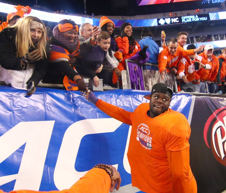 Credit Ken Ruinard           Clemson defensive end Shaq Lawson celebrates with fans after the ACC Championship game in Charlotte North Carolina