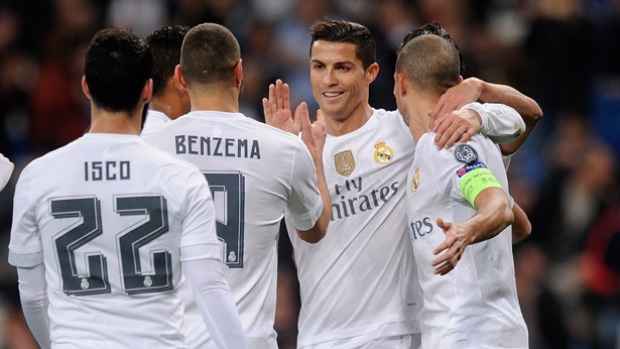 Ronaldo second from right fired in four goals in Real Madrid's 8-0 victory over Malmo to become the first player to score 10 or more goals in Champions League group stage play