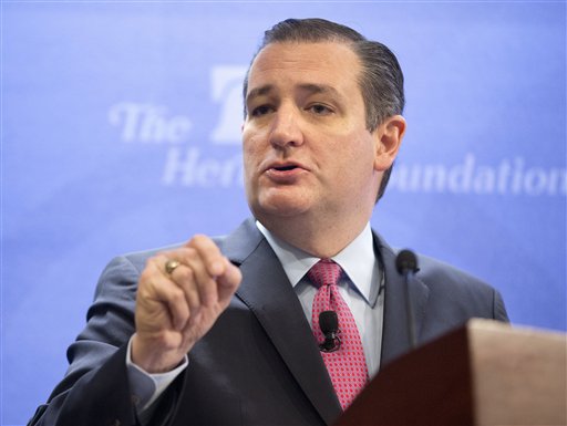 Donald Trump will be standing at center stage but Ted Cruz above will be in the spotlight during Tuesday's Republican presidential debate. The Texas senator is challenging Trump's lead in Iowa and has the money campaign infrastructure and