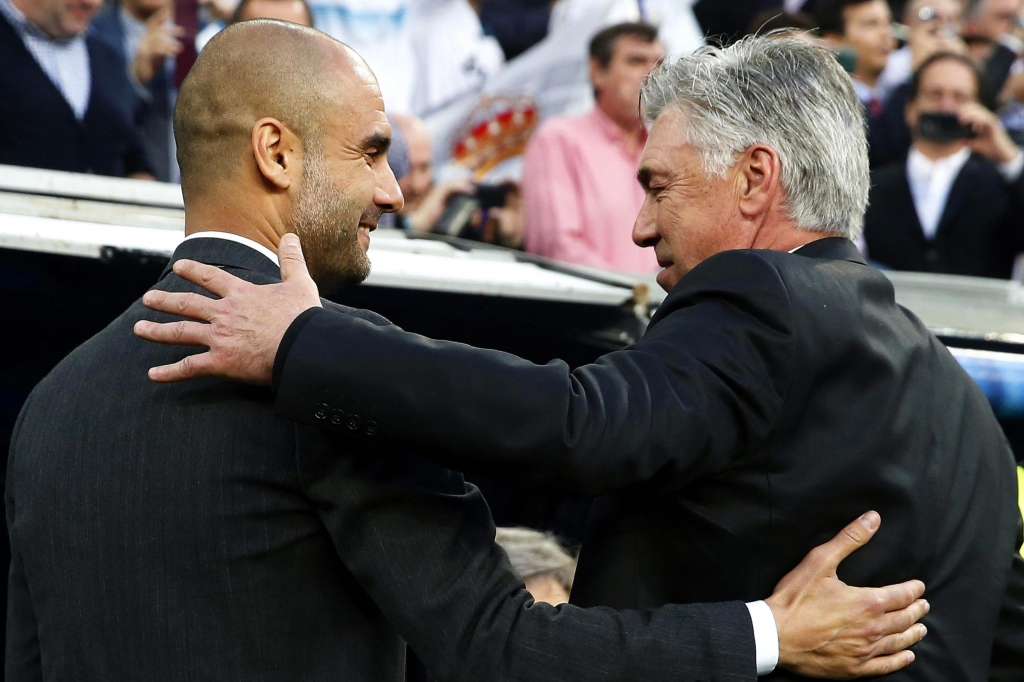 Current Bayern Munich manager Pep Guardiola with future manager Carlo Ancelotti