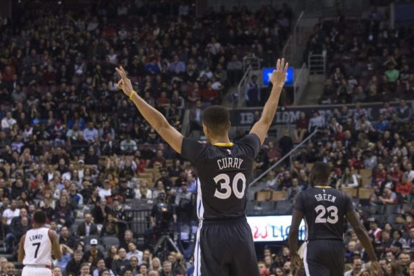 Golden State Warriors Stephen Curry celebrates after teammate