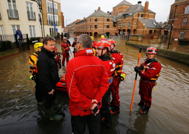 David Cameron meets flood relief workers in York after the river Ouse burst its banks