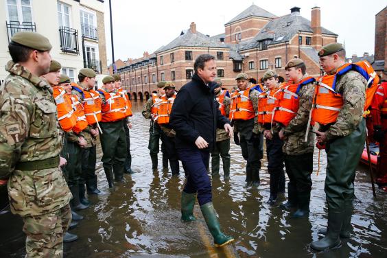 David Cameron speaks to Army personnel aiding the relief effort