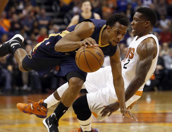 Eric Bledsoe fouls New Orleans Pelicans guard Ish Smith in the first quarter during an NBA basketball game Wednesday Nov. 25 2015 in Phoenix