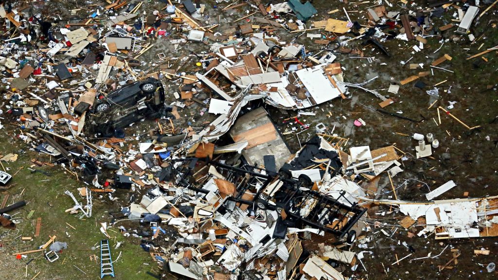 Debris of homes spread out after Saturday's tornado in Garland Texas Sunday Dec. 27 2015