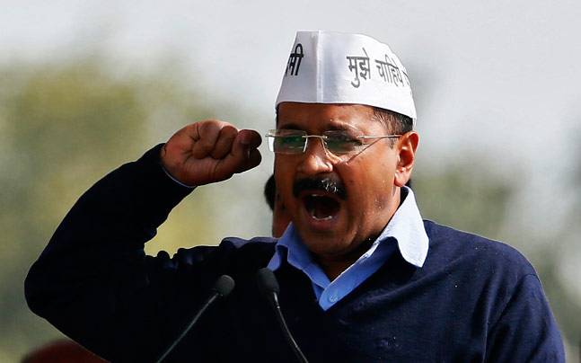 Delhi Chief Minister Arvind Kejriwal gestures as he addresses the media in New Delhi