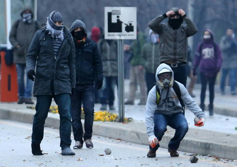 Demonstrators clash with anti-riot police outside the Middle Eastern Technical University in Ankara