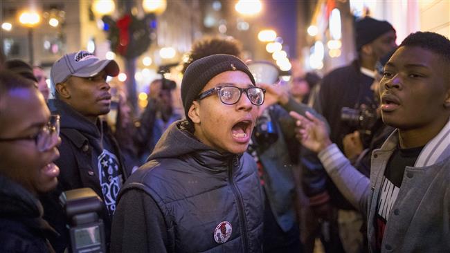 Demonstrators march through downtown Chicago Illinois