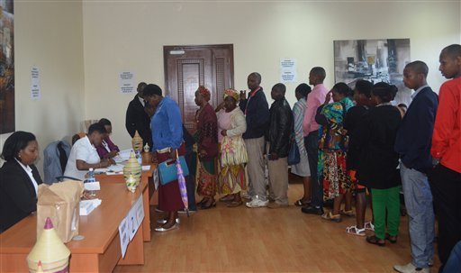 Rwandans in Nairobi Kenya line up to vote at the Rwandan Embassy Thursday Dec. 17 2015 in a referendum to decide whether to extend President Paul Kagames term in office in Rwanda