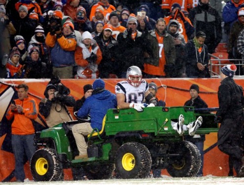 Denver fans applaud Patriots tight end Rob Gronkowski as he is carted off the field in the fourth quarter Sunday