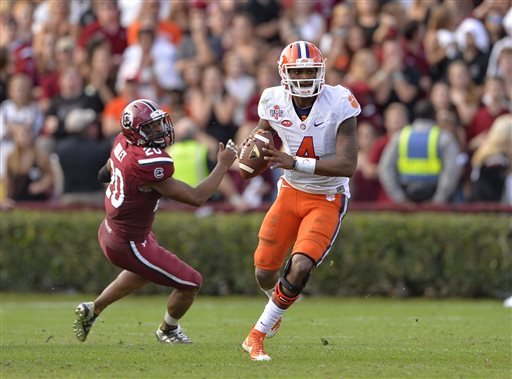 Deshaun Watson scrambling out of the pocket looking for a receiver during the second half of an NCAA college football game against South Carolina in Columbia S.C. Alabama running back Derrick