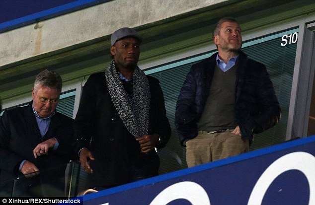 Didier Drogba sat between Guus Hiddink and Roman Abramovich at Stamford Bridge on Saturday