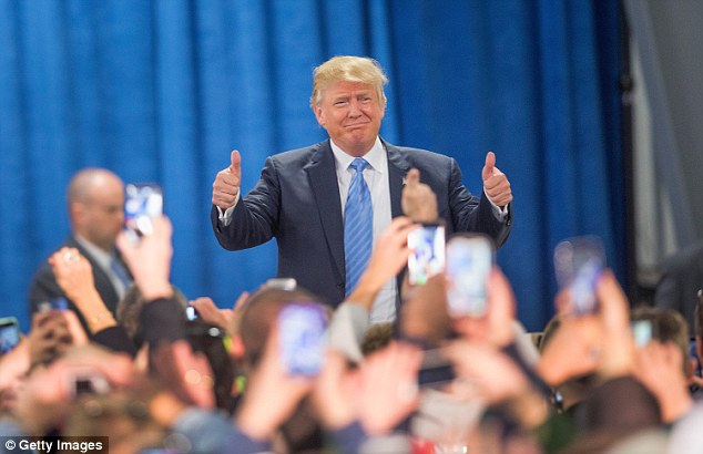 Donald Trump's seen here arriving at a campaign event in Davenport Iowa on Saturday. A new survey that began before his controversial plan to ban Muslims came out but ended a day after has him 19 points ahead of Ted Cruz and 22 points in front of Ben