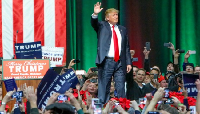 Donald Trump greets supporters at the Delta Plex Dec. 21 2015