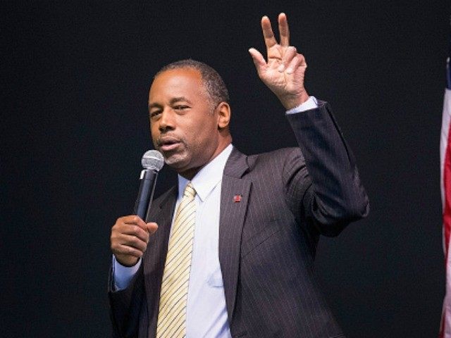 Republican presidential candidate Ben Carson speaks to guests at a barbeque hosted by Jeff Kauffman chairman of the Republican party of Iowa