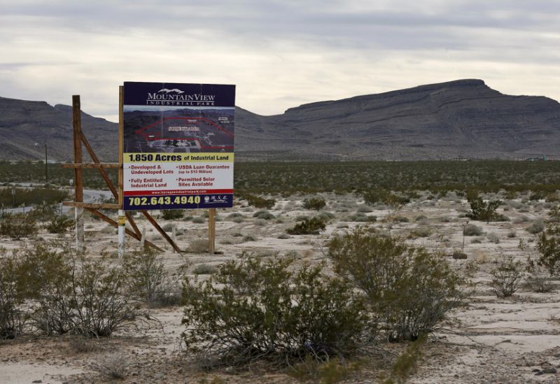 A sign advertises Mountain View Industrial Park near Apex Industrial Park on Wednesday Dec. 9 2015 in North Las Vegas Nev. Chinese-backed electric carmaker Faraday Future plans to build a manufacturing plant near the site according to a letter the