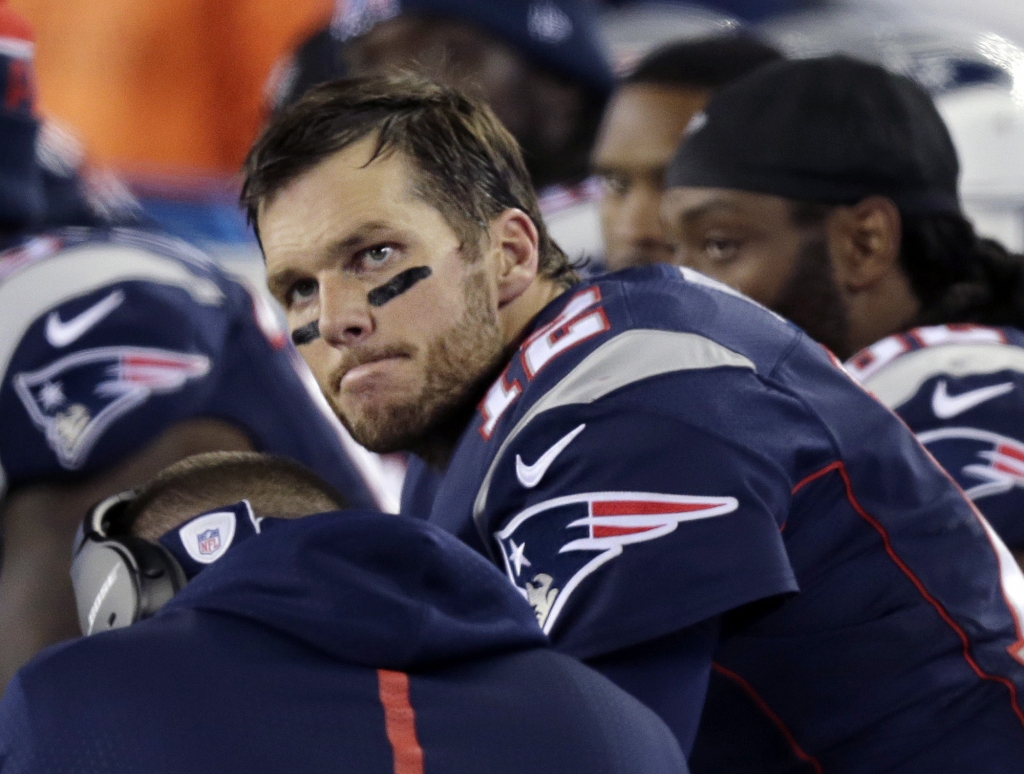 New England Patriots quarterback Tom Brady watches from the sideline during the second half of an NFL football game against the Philadelphia Eagles Sunday Dec. 6 2015 in Foxborough Mass.  ORG XMIT FBO129