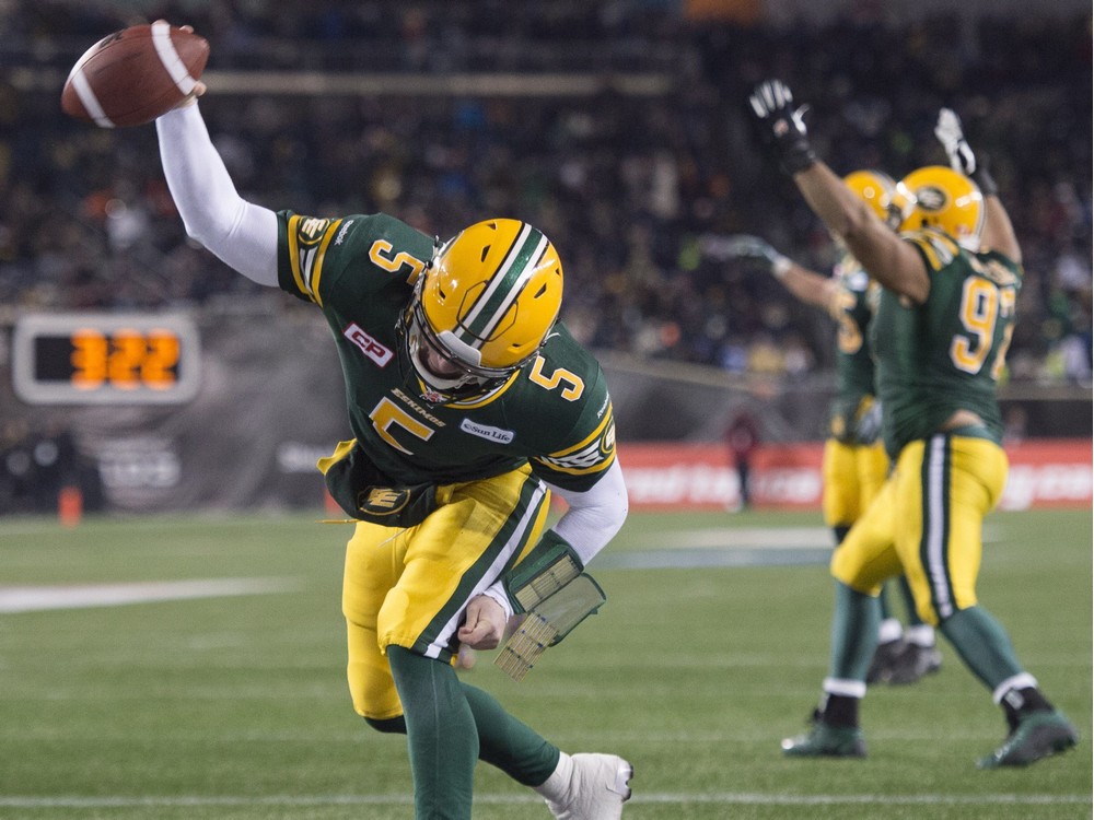 The Edmonton Eskimos&#039 Jordan Lynch celebrates his one-yard touchdown run — a Grey Cup-winning touchdown that was set up by a defensive pass interference call against the Ottawa Redblacks