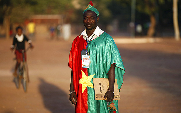 Election observer Blaise Kamate poses for