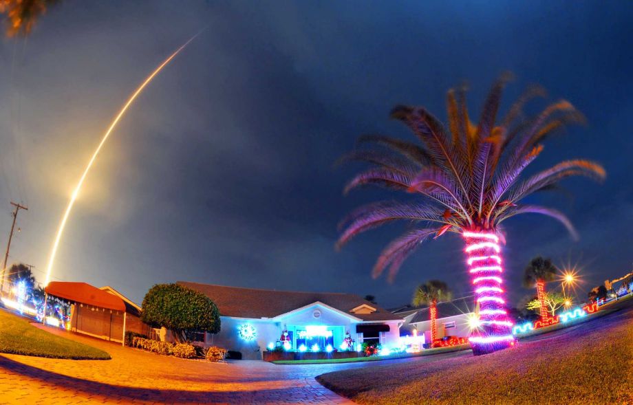 The SpaceX Falcon 9 rocket lifts off over Cocoa Beach Fla. at Cape Canaveral Air Force Station Monday Dec. 21 2015. The rocket carrying several communications satellites for Orbcomm Inc. is the first launch of the rocket since a failed mission