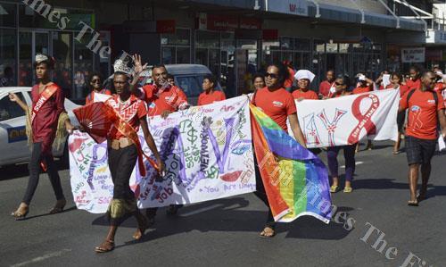 People march during World AIDS Day in Lautoka