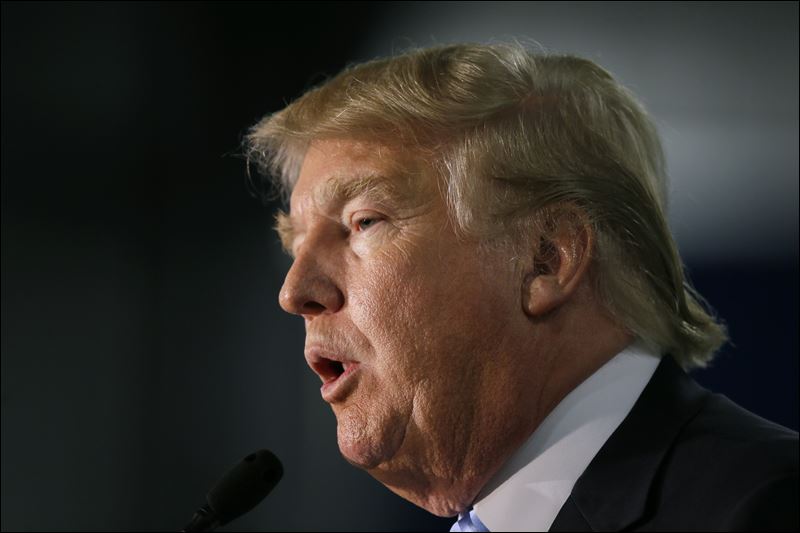 Republican presidential candidate Donald Trump speaks during a campaign rally today in Davenport Iowa