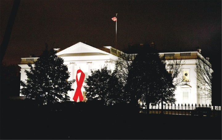 FIGHT AGAINST HIV  AIDS – A red ribbon is draped over the North Portico of the White House to mark World AIDS Day December 1 in Washington