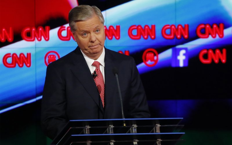 Republican U.S. presidential candidate Senator Lindsey Graham delivers his opening statement during a forum for lower polling candidates held prior to the Republican presidential debate in Las Vegas Nevada