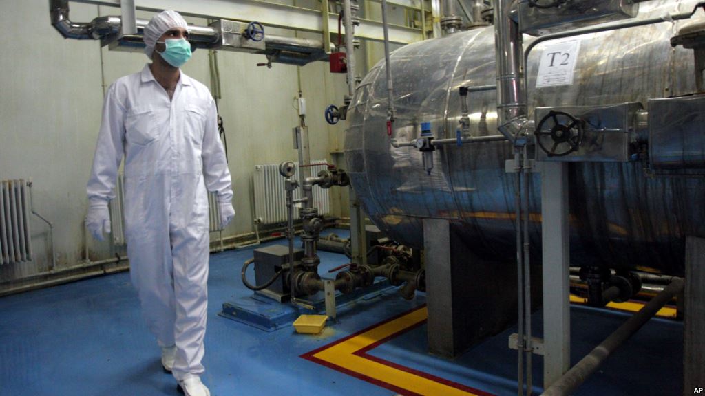 FILE- An Iranian technician walks through the Uranium Conversion Facility in Iran in February 2007