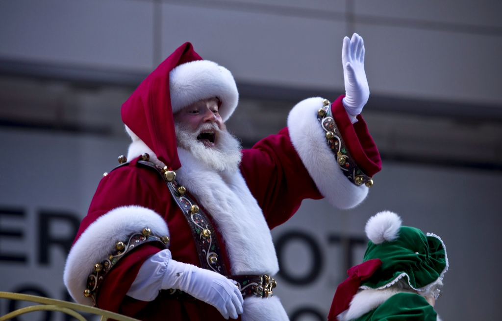 FILE- Santa Claus waves during the Macy's Thanksgiving Day Parade