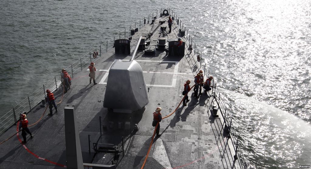 FILE- Taiwan navy soldiers take part during a joint military drill on a Kidd-class destroyer outside a naval base in Kaohsiung Taiwan