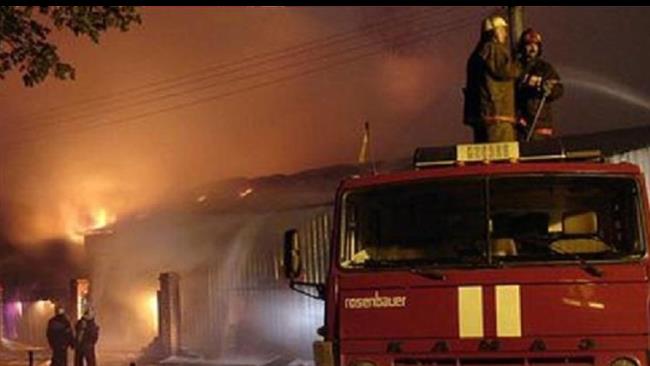 Firefighters try to cease the fire in a mental hospital near the Russian capital Moscow