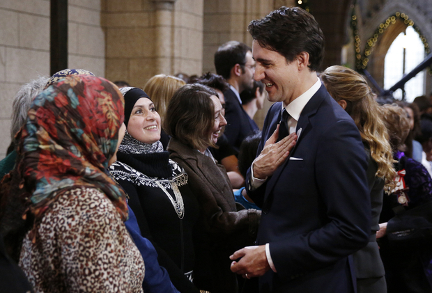 Syrian refugees headed to Canada on first planeload