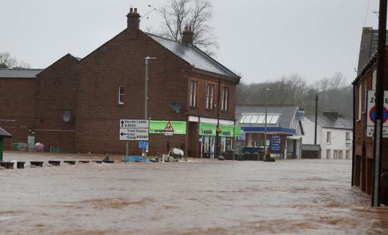 Flooded roads in Appleby in Cumbria as Storm Desmond hits the UK