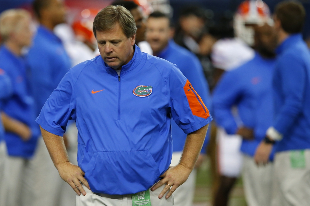 Head coach Jim Mc Elwain of the Florida Gators looks on before the SEC Championship against the Alabama Crimson Tide at the Georgia Dome