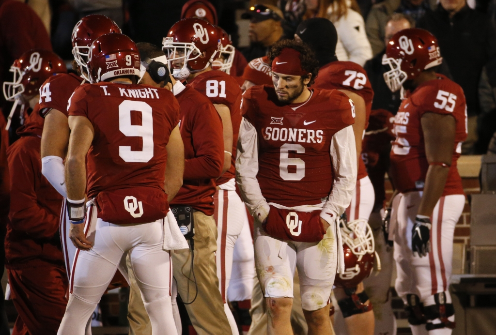 Nov 21 2015 Norman OK USA Oklahoma Sooners quarterback Baker Mayfield stands on the sidelines without a helmet behind quarterback Trevor Knight during the second half against the TCU Horned Frogs at Gaylord Family- Oklahoma Memorial Stadium