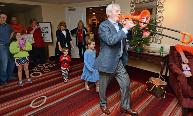 Frank Beamer leading the march with his new trombone in Shreveport this week