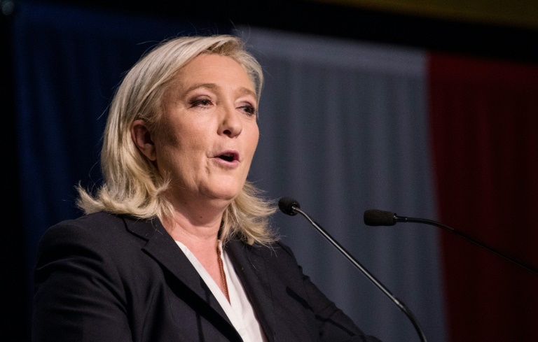 AFP  File  Denis CharletFrance's far-right National Front leader Marine Le Pen addresses supporters at a polling station in Henin-Beaumont